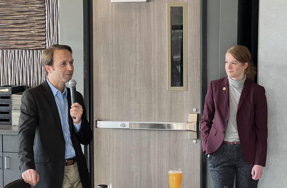 Sen Mallory McMorrow and Brian Calley stand together at Brown Iron Brewhouse in Royal Oak